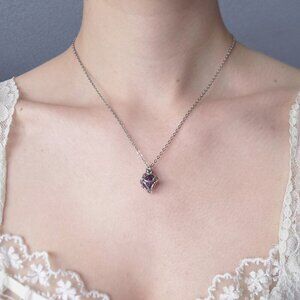 Dainty purple pearl necklace with a small silver chain